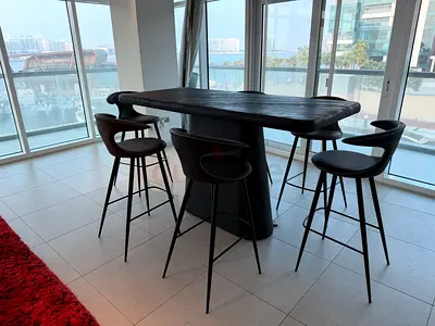 Stunning Marina Home Ombak Table and 6 Stools