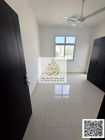 🌟 شقة غرفتين وصالة و3 حمامات مع خزانات حائط | الراشدية – عجمان (42 ألف - 4 دفعات)