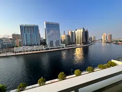 Upgraded! Fully Furnished | Canal & Burj Khalifa View | Prime Location