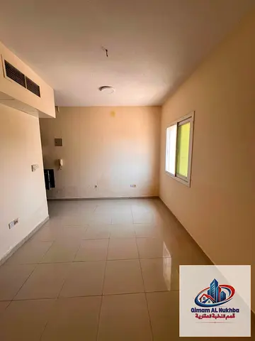 Top studio in Al Qulaiah, large space, central AC/gas, flexible payments, free maintenance & parking, near Corniche & Sharjah Ladies Club.