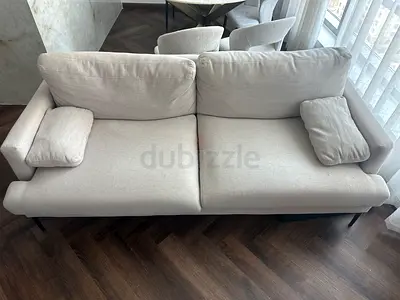 Light grey 3-seater fabric sofa in good condition
