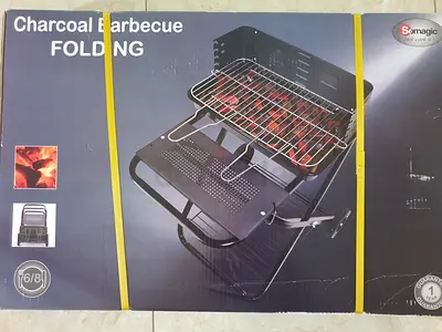 Brand new ! 100 AED only ! Charcoal BBQ folding, compact and portable.