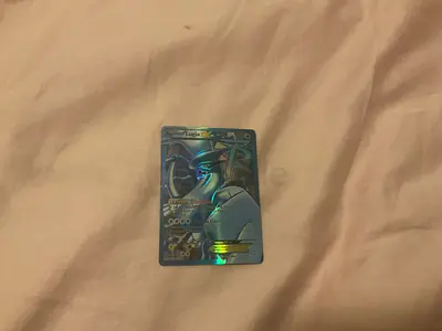 100% Authentic Vintage Lugia EX Full Art 134/135 - Team Plasma Storm (2013)