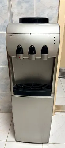 Standing Water Dispenser Cooler - Silver (functional) with small water drops leak