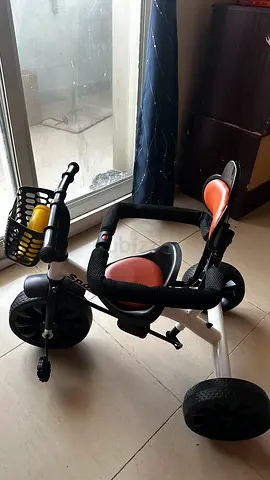Lightweight toddler tricycle with parent handle and basket, also roof is there -never used brand new