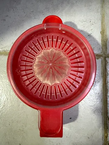 Used plastic kitchen strainer/colander with handle