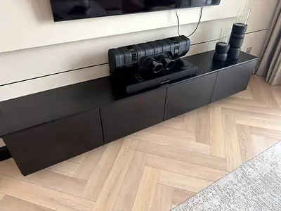 Modern low black TV cabinet / media console - 4-door unit