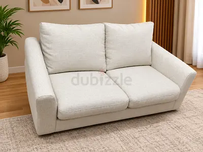 2-seater light beige fabric sofa in excellent condition