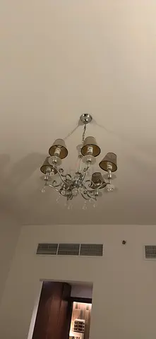FREE.  6-arm crystal chandelier with beige shades - gently used