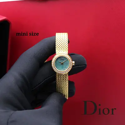 Dior mini women's gold-tone Master quality watch with mother-of-pearl dial and crystal bezel