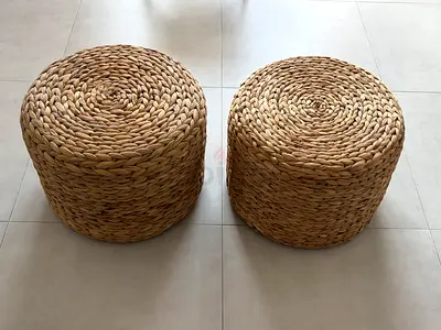 Pair of woven seagrass poufs / ottomans