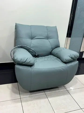 Single leather recliner armchair in light grey - good condition