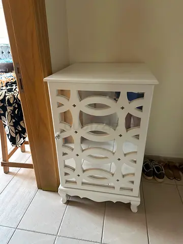White decorative bedside cabinet with mirrored front