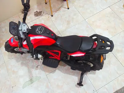 I wany to sell Kids Electric Ride-On Motorcycle - Red, Good Working Condition charger also available