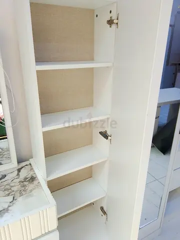 Tall White Storage Cabinet with Multiple Shelves - Good Condition
