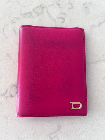 Delvaux authentic Pink leather women's wallet with D logo - gently used