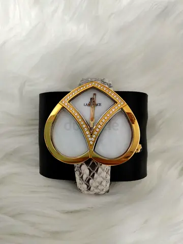 Ladies large gold-tone heart cuff watch with snake-print band