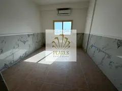 For rent in Al Rawda 2, Ajman. One-bedroom apartment with open-view balcony, built-in wardrobes, lau
