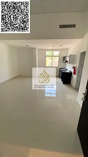 For annual rent in Ajman: A studio with an open-plan kitchen, very spacious, and featuring excellent