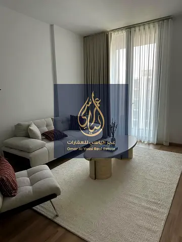 شقة مفروشة سوبر ديلوكس للبيع في الجادة بإطلالة على المسبح والحديقة