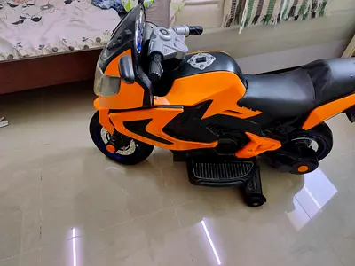Electric Ride-On Kids Motorcycle - Orange, Good Condition