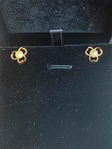 Pair of gold-tone 21K stud earrings with natural Bahraini sea pearls
