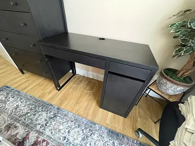 Compact black computer desk with drawers — good condition