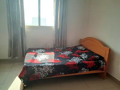 A spacious Master bedroom with attached bathroom