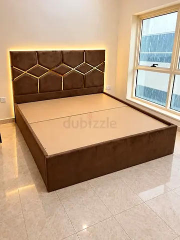 Modern upholstered king-size bed with LED headboard