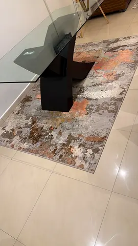 Modern abstract area rug in neutral tones — good condition