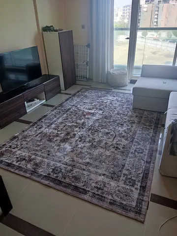 Large Vintage-Style Area Rug - Neutral Tones, Good Condition