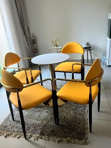Marble top coffee table with four chairs