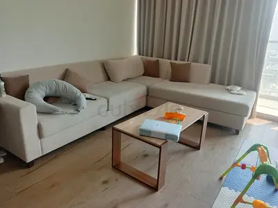 Beige L-shaped Corner Sofa with Ottoman - Good Condition