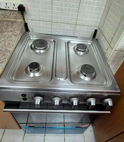 Used 4-Burner Stainless Steel Gas Stove with Oven