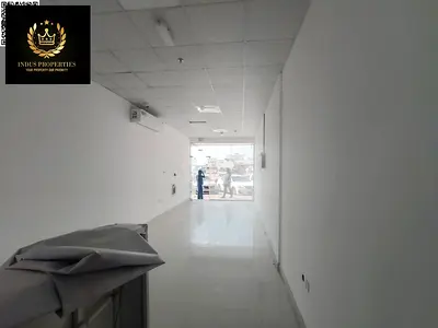 spacious shop available for rent on main road in al jurf industrial 2 near central jail ajman with size 415sqft only in 33000aed in 4 payment