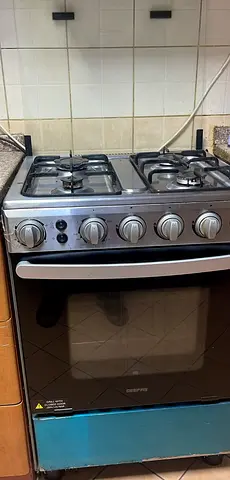 Used freestanding gas stove with oven - 4 burners, good working condition