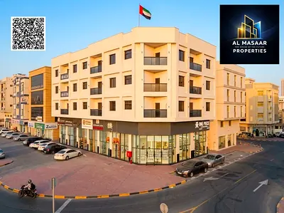 New residential-commercial building in Al Alia, Ajman | Ground floor + Mezzanine + 3 floors | 10 sh