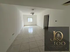 Spacious 2-bedroom apartment with a living room | 2 balconies | Central A/C | Easy access to Dubai a