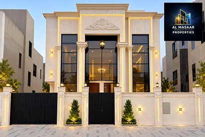 Classic-style villa in the Al Yasmeen area, Ajman, featuring a distinctive design. Available for freehold ownership by all nationalities, with bank fi