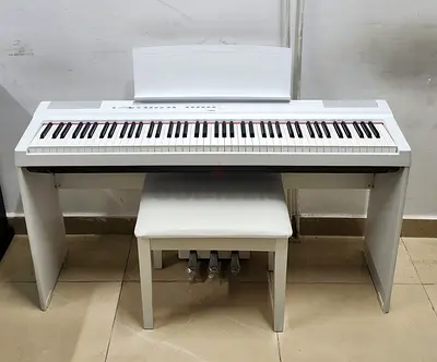 The Yamaha P125WH is a white, compact 88-key digital piano featuring graded hammer action and the
