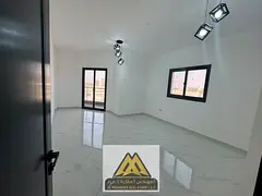 A two-bedroom apartment with a separate living room is available for annual rent in Al Hamidiya 1, A