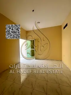 For rent: a room, living room, kitchen, bathroom and balcony in Al Rawda 2, Ajman, near Sheikh Ammar