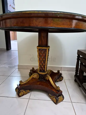 Antique round inlaid wooden dining/center table with glass top
