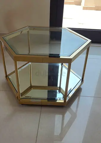 Hexagonal gold metal and glass side table (two-tier) from Bloomingdales  have two available