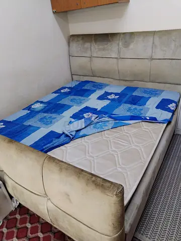 Queen size upholstered bed frame with mattress (used)