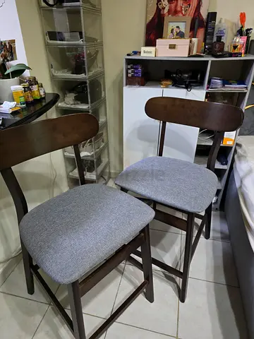 Set of 2 wooden bar stools with grey upholstered seats — good condition