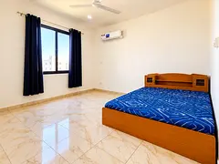 Spacious Furnished Room for Rent with AC & Kitchen Access