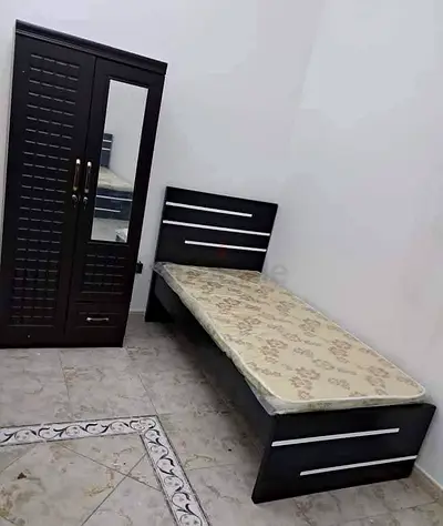 Brand new Single size bed frame with Mattress and two door Cabinet Available