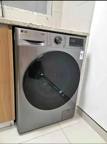 LG ThinQ 11kg washing machine in flawless condition.