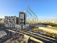 Two bedrooms, a lounge, 3 bathrooms and a balcony with an open view of Khalifa Street, City Tower Na